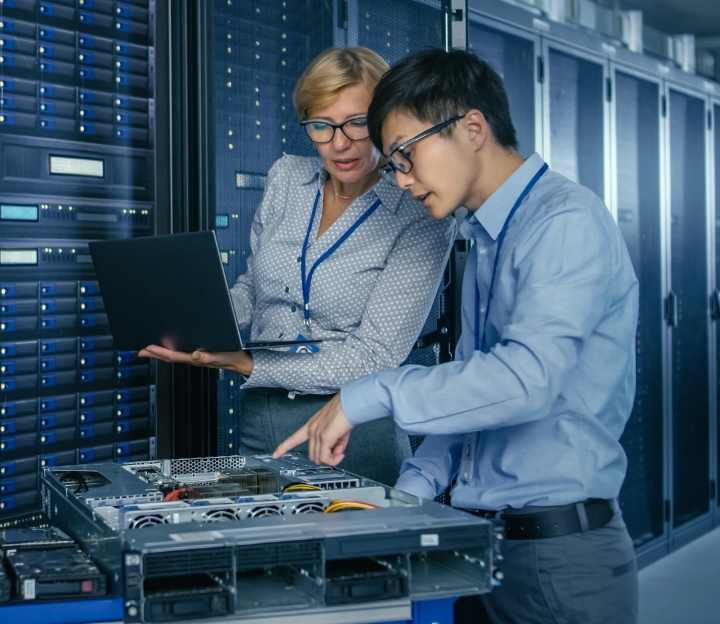 Engineers working in a data center